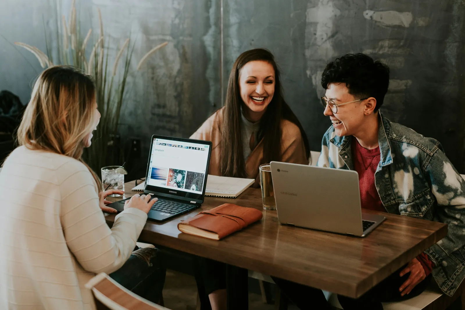 People collaborating at a tech event