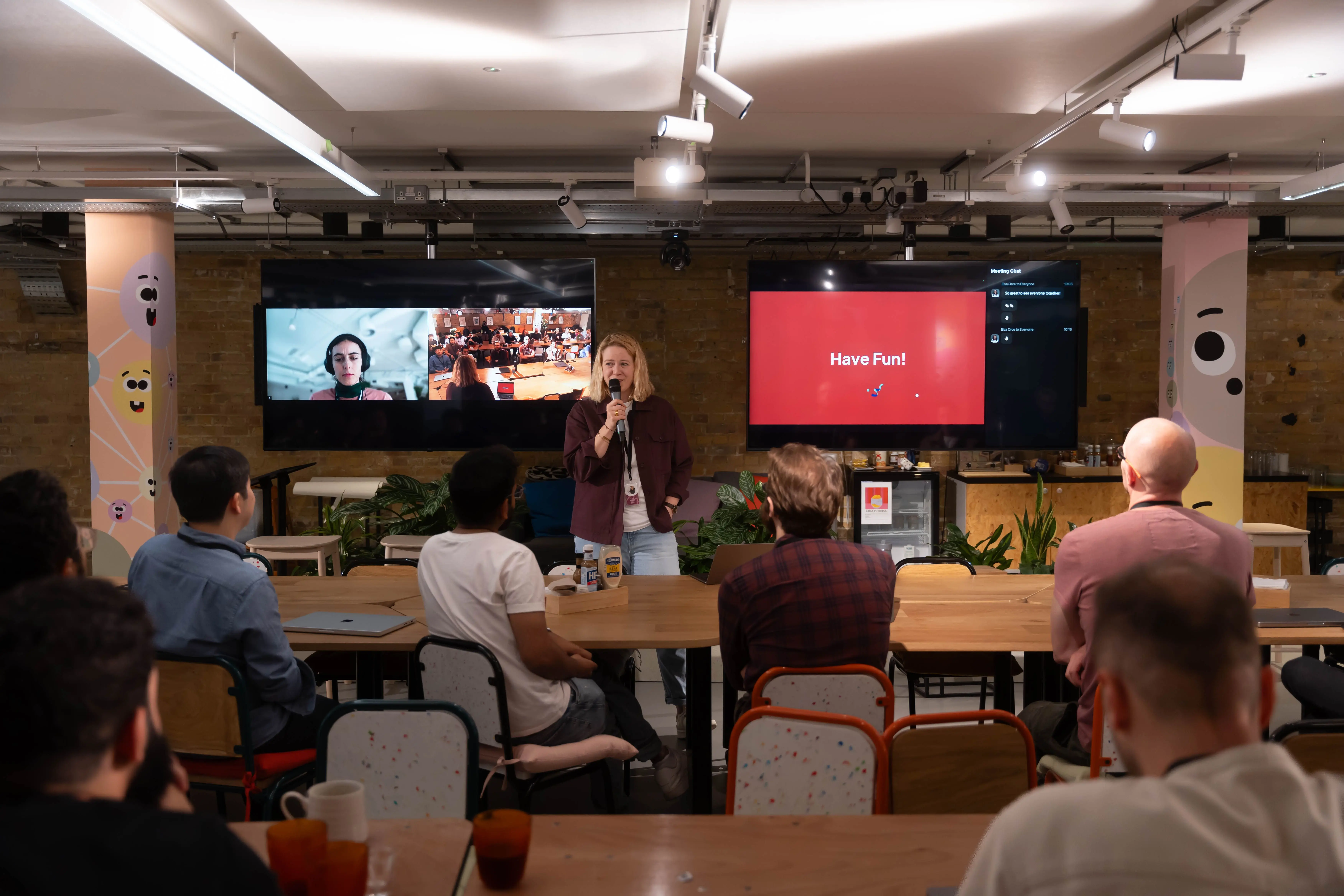 People collaborating at a tech event